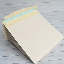 Переплет на 7 разворотов, с листами 15х15, цвет голубой, шаг 1 см