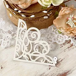 Украшение из чипборда "Ажурный уголок 3" (LeoMammy) Украшение из чипборда "Ажурный уголок 3" (LeoMammy)