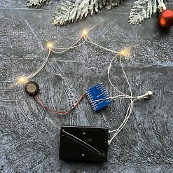 Музыкальный модуль с 4 мигающими белыми светодиодами и мелодией "Let it snow", сменная батарейка (ScrapIllumination)